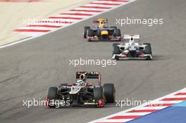 Kimi Raikkonen (FIN) Lotus E20. Motor Racing - Formula One World Championship - Bahrain Grand Prix - Race Day - Sakhir, Bahrain