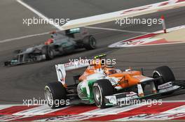 Nico Hulkenberg (GER), Sahara Force India Formula One Team leads Michael Schumacher (GER), Mercedes AMG Petronas  22.04.2012. Formula 1 World Championship, Rd 4, Bahrain Grand Prix, Sakhir, Bahrain, Race Day