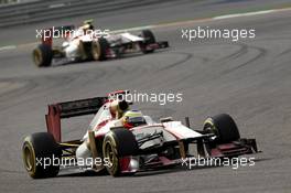 Pedro de la Rosa (ESP), HRT Formula One Team leads Narain Karthikeyan (IND), HRT Formula One Team  22.04.2012. Formula 1 World Championship, Rd 4, Bahrain Grand Prix, Sakhir, Bahrain, Race Day