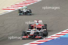 Lewis Hamilton (GBR) McLaren MP4/27 leads Fernando Alonso (ESP) Ferrari F2012. Motor Racing - Formula One World Championship - Bahrain Grand Prix - Race Day - Sakhir, Bahrain