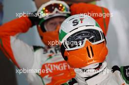 Sahara Force India F1 Team mechanics watch the race. Motor Racing - Formula One World Championship - Bahrain Grand Prix - Race Day - Sakhir, Bahrain