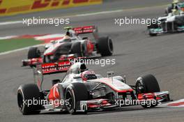 Jenson Button (GBR), McLaren Mercedes leads Lewis Hamilton (GBR), McLaren Mercedes  22.04.2012. Formula 1 World Championship, Rd 4, Bahrain Grand Prix, Sakhir, Bahrain, Race Day