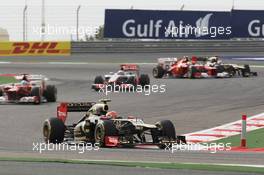 Romain Grosjean (FRA) Lotus F1 E20. Motor Racing - Formula One World Championship - Bahrain Grand Prix - Race Day - Sakhir, Bahrain