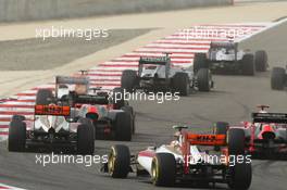 Narain Karthikeyan (IND) HRT Formula One Team HRT F112. Motor Racing - Formula One World Championship - Bahrain Grand Prix - Race Day - Sakhir, Bahrain