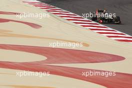 Kimi Raikkonen (FIN) Lotus E20. Motor Racing - Formula One World Championship - Bahrain Grand Prix - Race Day - Sakhir, Bahrain