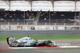 Nico Rosberg (GER), Mercedes AMG Petronas passing an empty grand stand  22.04.2012. Formula 1 World Championship, Rd 4, Bahrain Grand Prix, Sakhir, Bahrain, Race Day