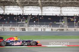Sebastian Vettel (GER), Red Bull Racing passing an empty grandstand 22.04.2012. Formula 1 World Championship, Rd 4, Bahrain Grand Prix, Sakhir, Bahrain, Race Day