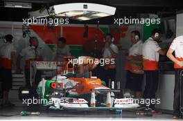 Paul di Resta (GBR) Sahara Force India VJM05 in the pits. 21.04.2012. Formula 1 World Championship, Rd 4, Bahrain Grand Prix, Sakhir, Bahrain, Qualifying Day