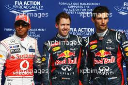 Qualifying top three in parc ferme (L to R): Lewis Hamilton (GBR) McLaren, second; Sebastian Vettel (GER) Red Bull Racing, pole position, Mark Webber (AUS) Red Bull Racing, third. 21.04.2012. Formula 1 World Championship, Rd 4, Bahrain Grand Prix, Sakhir, Bahrain, Qualifying Day
