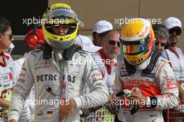 Nico Rosberg (GER), Mercedes AMG Petronas and Lewis Hamilton (GBR), McLaren Mercedes  21.04.2012. Formula 1 World Championship, Rd 4, Bahrain Grand Prix, Sakhir, Bahrain, Qualifying Day