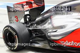 McLaren MP4/27 exhaust and rear suspension detail. 21.04.2012. Formula 1 World Championship, Rd 4, Bahrain Grand Prix, Sakhir, Bahrain, Qualifying Day
