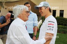(L to R): Bernie Ecclestone (GBR) CEO Formula One Group (FOM) with Nico Rosberg (GER) Mercedes AMG F1. 21.04.2012. Formula 1 World Championship, Rd 4, Bahrain Grand Prix, Sakhir, Bahrain, Qualifying Day