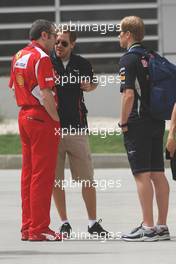 (L to R): Stefano Domenicali (ITA) Ferrari General Director with Sebastian Vettel (GER) Red Bull Racing and Heikki Huovinen (FIN) Personal Trainer. 21.04.2012. Formula 1 World Championship, Rd 4, Bahrain Grand Prix, Sakhir, Bahrain, Qualifying Day