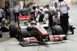 Jenson Button (GBR) McLaren MP4/27 in the pits. 21.04.2012. Formula 1 World Championship, Rd 4, Bahrain Grand Prix, Sakhir, Bahrain, Qualifying Day