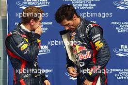 (L to R): Pole sitter Sebastian Vettel (GER) Red Bull Racing with Mark Webber (AUS) Red Bull Racing in parc ferme. 21.04.2012. Formula 1 World Championship, Rd 4, Bahrain Grand Prix, Sakhir, Bahrain, Qualifying Day