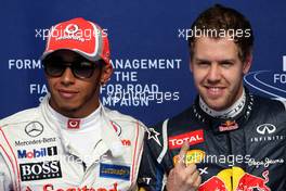 Lewis Hamilton (GBR), McLaren Mercedes and Sebastian Vettel (GER), Red Bull Racing  21.04.2012. Formula 1 World Championship, Rd 4, Bahrain Grand Prix, Sakhir, Bahrain, Qualifying Day
