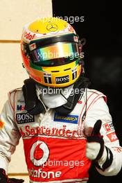 Lewis Hamilton (GBR) McLaren celebrates his second position in parc ferme. 21.04.2012. Formula 1 World Championship, Rd 4, Bahrain Grand Prix, Sakhir, Bahrain, Qualifying Day
