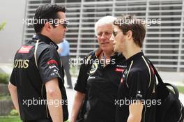 Eric Boullier (FRA) Lotus F1 Team Principal (Left) and Romain Grosjean (FRA) Lotus F1 Team (Right). 21.04.2012. Formula 1 World Championship, Rd 4, Bahrain Grand Prix, Sakhir, Bahrain, Qualifying Day