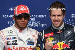 Lewis Hamilton (GBR), McLaren Mercedes and Sebastian Vettel (GER), Red Bull Racing  21.04.2012. Formula 1 World Championship, Rd 4, Bahrain Grand Prix, Sakhir, Bahrain, Qualifying Day