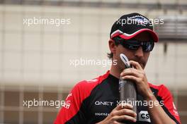 Timo Glock (GER) Marussia F1 Team on the drivers parade. Motor Racing - Formula One World Championship - Bahrain Grand Prix - Race Day - Sakhir, Bahrain