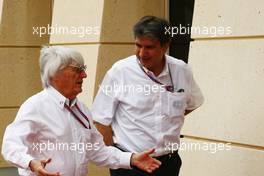 (L to R): Bernie Ecclestone (GBR) CEO Formula One Group (FOM) with Pasquale Lattuneddu (ITA) of the FOM. Motor Racing - Formula One World Championship - Bahrain Grand Prix - Race Day - Sakhir, Bahrain