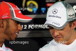 (L to R): Lewis Hamilton (GBR) McLaren and Nico Rosberg (GER) Mercedes AMG F1 in the FIA Press Conference. 19.04.2012. Formula 1 World Championship, Rd 4, Bahrain Grand Prix, Sakhir, Bahrain, Preparation Day