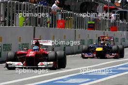 Fernando Alonso (ESP), Scuderia Ferrari and Sebastian Vettel (GER), Red Bull Racing  23.11.2012. Formula 1 World Championship, Rd 20, Brazilian Grand Prix, Sao Paulo, BRA, Practice Day