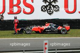 Charles Pic (FRA) Marussia F1 Team MR01 stopped in the second practice session. 23.11.2012. Formula 1 World Championship, Rd 20, Brazilian Grand Prix, Sao Paulo, Brazil, Practice Day.