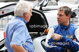 (L to R): Charlie Whiting (GBR) FIA Delegate with Bernd Maylander (GER) FIA Safety Car Driver on the grid. 25.11.2012. Formula 1 World Championship, Rd 20, Brazilian Grand Prix, Sao Paulo, Brazil, Race Day.
