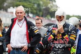 Sebastian Vettel (GER) Red Bull Racing and Dr Helmut Marko (AUT) Red Bull Motorsport Consultant on the grid. 25.11.2012. Formula 1 World Championship, Rd 20, Brazilian Grand Prix, Sao Paulo, Brazil, Race Day.