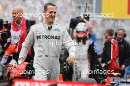 Michael Schumacher (GER) Mercedes AMG F1 W03 says goodbye to F1 in parc ferme. 25.11.2012. Formula 1 World Championship, Rd 20, Brazilian Grand Prix, Sao Paulo, Brazil, Race Day.