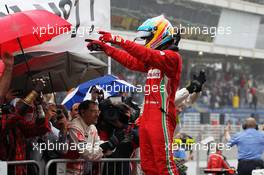 Fernando Alonso (ESP) Ferrari celebrates his second position in parc ferme. 25.11.2012. Formula 1 World Championship, Rd 20, Brazilian Grand Prix, Sao Paulo, Brazil, Race Day.