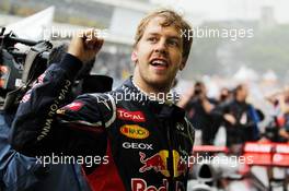 Sebastian Vettel (GER) Red Bull Racing celebrates his World Championship in parc ferme. 25.11.2012. Formula 1 World Championship, Rd 20, Brazilian Grand Prix, Sao Paulo, Brazil, Race Day.