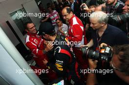 Sebastian Vettel (GER) Red Bull Racing celebrates his World Championship with Stefano Domenicali (ITA) Ferrari General Director. 25.11.2012. Formula 1 World Championship, Rd 20, Brazilian Grand Prix, Sao Paulo, Brazil, Race Day.