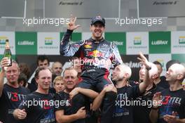 Sebastian Vettel (GER) Red Bull Racing celebrates winning the World Championship with the team. 25.11.2012. Formula 1 World Championship, Rd 20, Brazilian Grand Prix, Sao Paulo, Brazil, Race Day.