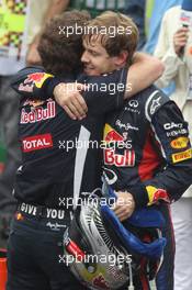 Christian Horner (GBR) Red Bull Racing Team Principal and Sebastian Vettel (GER), Red Bull Racing  25.11.2012. Formula 1 World Championship, Rd 20, Brazilian Grand Prix, Sao Paulo, BRA, Race Day