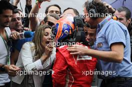 Felipe Massa (BRA) Ferrari celebrates his third position in parc ferme with wife Rafaela Bassi (BRA). 25.11.2012. Formula 1 World Championship, Rd 20, Brazilian Grand Prix, Sao Paulo, Brazil, Race Day.