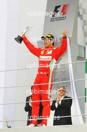 Felipe Massa (BRA) Ferrari celebrates his third position on the podium. 25.11.2012. Formula 1 World Championship, Rd 20, Brazilian Grand Prix, Sao Paulo, Brazil, Race Day.