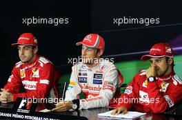 The FIA Press Conference (L to R): Fernando Alonso (ESP) Ferrari, second; Jenson Button (GBR) McLaren, race winner; Fernando Alonso (ESP) Ferrari, third. 25.11.2012. Formula 1 World Championship, Rd 20, Brazilian Grand Prix, Sao Paulo, Brazil, Race Day.