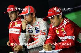 The FIA Press Conference (L to R): Fernando Alonso (ESP) Ferrari, second; Jenson Button (GBR) McLaren, race winner; Fernando Alonso (ESP) Ferrari, third. 25.11.2012. Formula 1 World Championship, Rd 20, Brazilian Grand Prix, Sao Paulo, Brazil, Race Day.