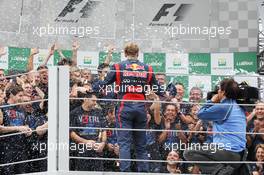 Sebastian Vettel (GER) Red Bull Racing celebrates his World Championship with the team. 25.11.2012. Formula 1 World Championship, Rd 20, Brazilian Grand Prix, Sao Paulo, Brazil, Race Day.