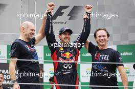 Sebastian Vettel (GER) Red Bull Racing celebrates his World Championship with Adrian Newey (GBR) Red Bull Racing Chief Technical Officer, Christian Horner (GBR) Red Bull Racing Team Principal and the team. 25.11.2012. Formula 1 World Championship, Rd 20, Brazilian Grand Prix, Sao Paulo, Brazil, Race Day.