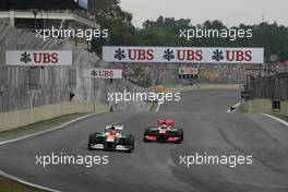 Nico Hulkenberg (GER), Sahara Force India Formula One Team and Jenson Button (GBR), McLaren Mercedes  25.11.2012. Formula 1 World Championship, Rd 20, Brazilian Grand Prix, Sao Paulo, BRA, Race Day