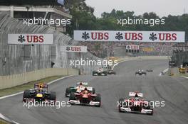 (L to R): Mark Webber (AUS) Red Bull Racing RB8; Felipe Massa (BRA) Ferrari F2012, and Fernando Alonso (ESP) Ferrari F2012 battle for position. 25.11.2012. Formula 1 World Championship, Rd 20, Brazilian Grand Prix, Sao Paulo, Brazil, Race Day.