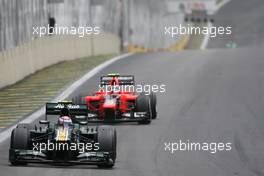 Vitaly Petrov (RUS), Caterham F1 Team and Charles Pic (FRA), Marussia F1 Team  25.11.2012. Formula 1 World Championship, Rd 20, Brazilian Grand Prix, Sao Paulo, BRA, Race Day