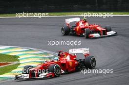Fernando Alonso (ESP) Ferrari F2012 leads team mate Felipe Massa (BRA) Ferrari F2012. 25.11.2012. Formula 1 World Championship, Rd 20, Brazilian Grand Prix, Sao Paulo, Brazil, Race Day.