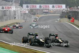 Vitaly Petrov (RUS), Caterham F1 Team and Heikki Kovalainen (FIN), Caterham F1 Team  25.11.2012. Formula 1 World Championship, Rd 20, Brazilian Grand Prix, Sao Paulo, BRA, Race Day