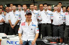 Kamui Kobayashi (JPN) Sauber C31 in a team photograph. 24.11.2012. Formula 1 World Championship, Rd 20, Brazilian Grand Prix, Sao Paulo, Brazil, Qualifying Day.