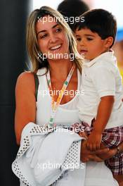 Rafaela Bassi (BRA), wife of Felipe Massa (BRA) Ferrari, with son Felipinho. 24.11.2012. Formula 1 World Championship, Rd 20, Brazilian Grand Prix, Sao Paulo, Brazil, Qualifying Day.