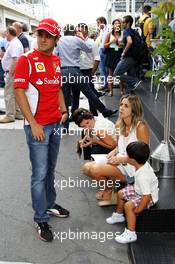 Felipe Massa (BRA) Ferrari with wife Rafaela Bassi (BRA) and son Felipinho. 24.11.2012. Formula 1 World Championship, Rd 20, Brazilian Grand Prix, Sao Paulo, Brazil, Qualifying Day.